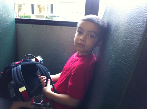 On the bus yesterday for kindergarten orientation.  He did just fine.